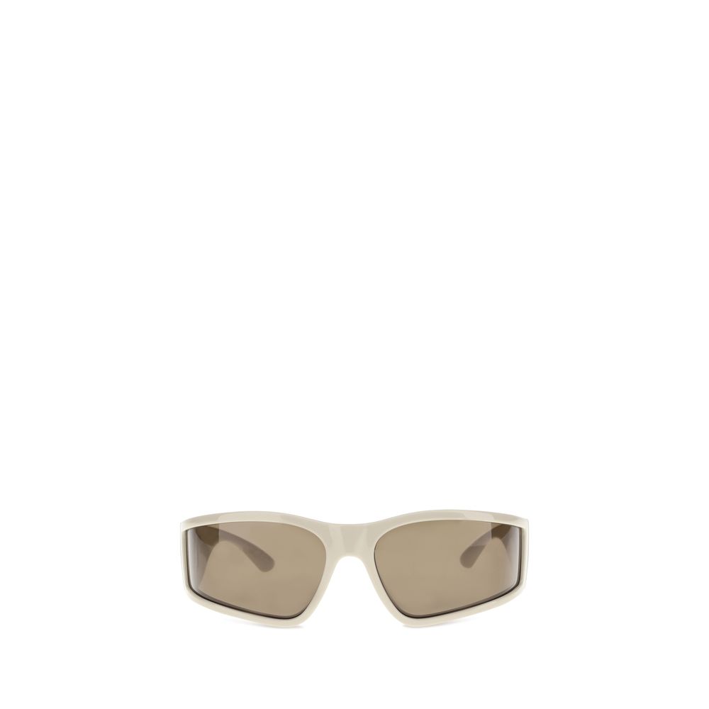Cream Polyamide SunglassesBalenciaga’s Sunset D-Frame Sunglasses combine innovative design and sustainability. Featuring a naturally sourced injected nylon frame and temples, they feature a D-frame design with lenses with curved sides that ensure a comfor