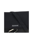 Black Polyamide Shoulder BagBalenciaga’s Explorer small Shoulder Bag is made of polyamide and polyester with a washed-out effect with a vintage character. This messenger model can be carried either over the shoulder or cross-body, thanks to the adjustable