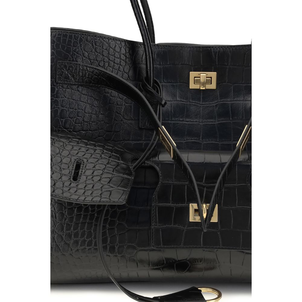 Black Calf Leather Bos Taurus Shoulder BagBalenciaga’s Bel Air medium Shoulder Bag is a sophisticated accessory in crocodile-effect calfskin leather. A versatile carry all, it can be carried either on the shoulder or in the hand thanks to the two handles