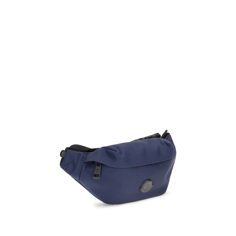 Blue Nylon Clutch BagMoncler’s Durance Fanny Pack is made of water-repellent nylon, perfect for providing protection and water resistance. Enhanced with quality leather trim, it features an adjustable belt for a customizable fit. The zippered closure and