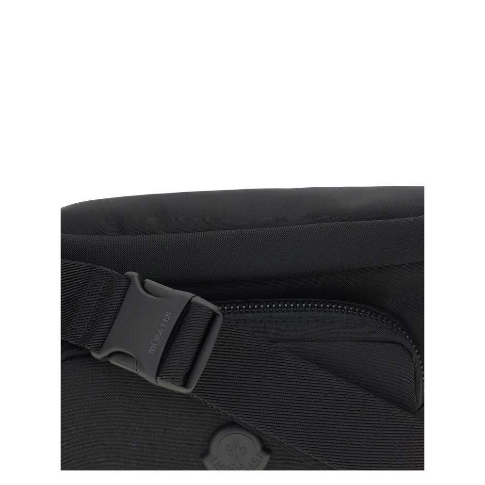 Black Nylon Clutch BagMoncler’s Durance Fanny Pack is made of water-repellent nylon, perfect for providing protection and water resistance. Enhanced with quality leather trim, it features an adjustable belt for a customizable fit. The zippered closure and
