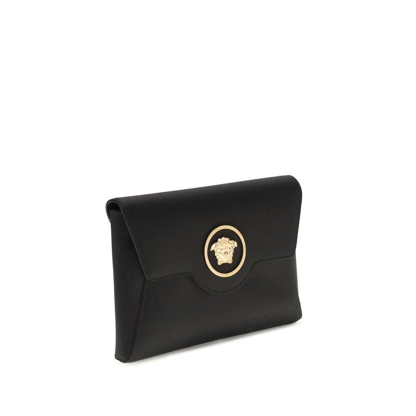 Black Calf Leather Bos Taurus Shoulder BagThe La Medusa Shoulder Bag by Versace is an elegant and iconic accessory, embellished with the distinctive metal La Medusa detail applied to the front flap. Equipped with a practical interior slit pocket, it featu