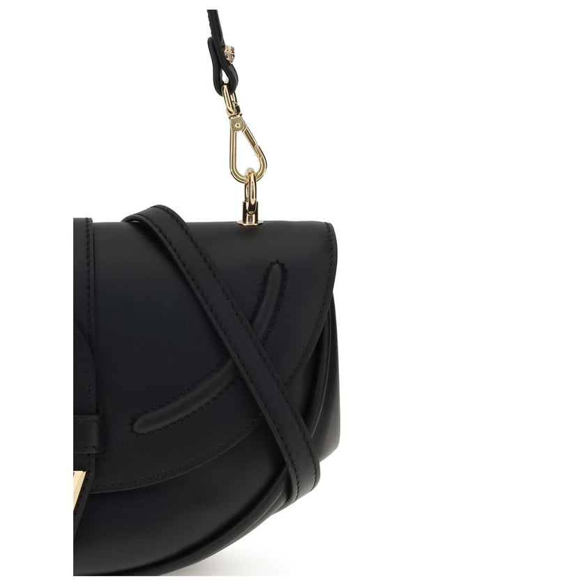 Black Calf Leather Bos Taurus Shoulder BagThe Medium Virtus Shoulder Bag by Versace embodies elegance and character with its iconic V-shaped accessory engraved with the Versace logo. Equipped with a front flap with magnetic closure, it features an interio
