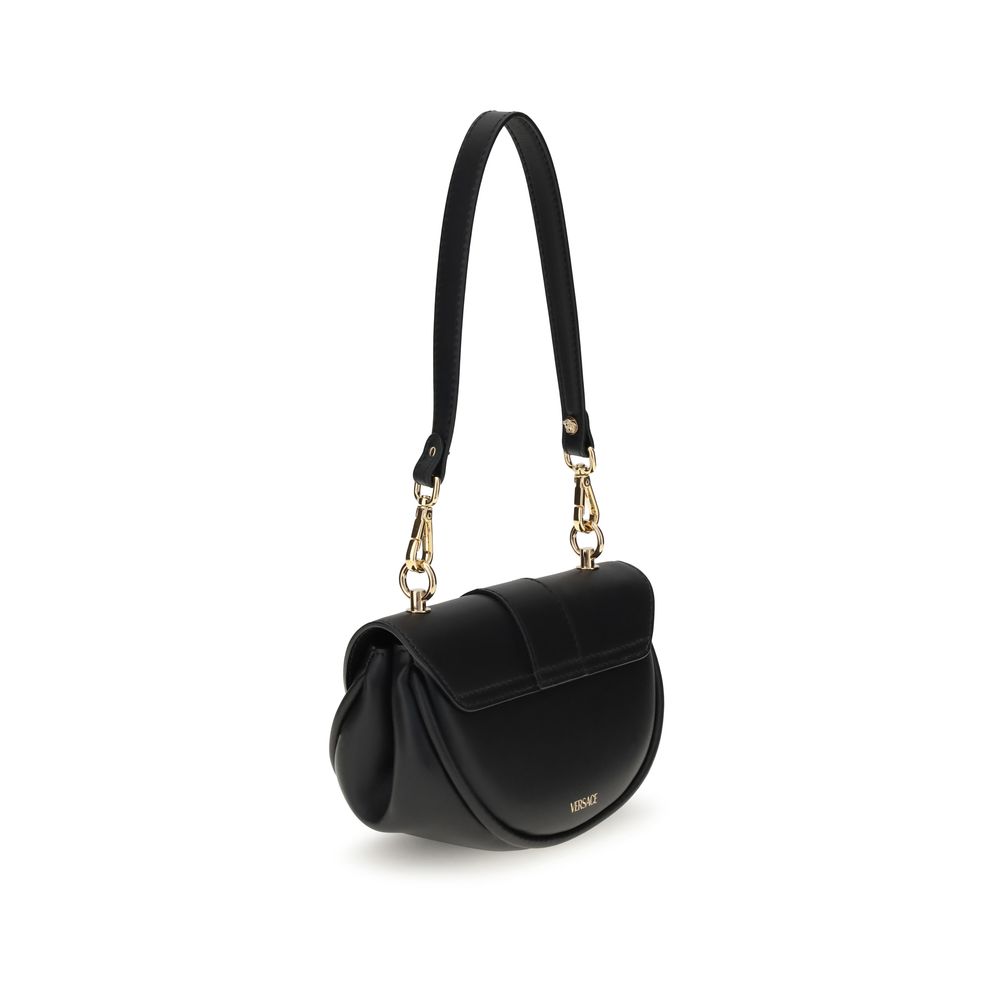Black Calf Leather Bos Taurus Shoulder BagVersace’s Virtus Small Shoulder Bag embodies elegance and character with its iconic V-shaped accessory engraved with the Versace logo. Equipped with a front flap with magnetic closure, it features an interior smal
