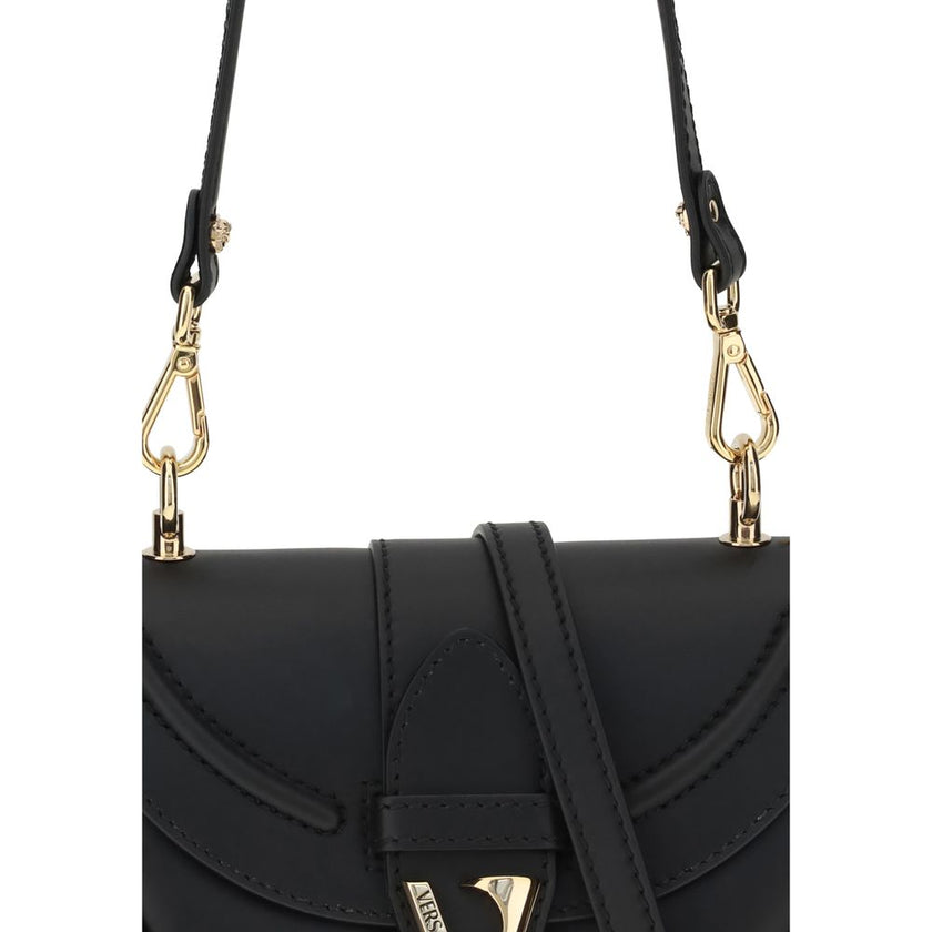 Black Calf Leather Bos Taurus Shoulder BagVersace’s Virtus Small Shoulder Bag embodies elegance and character with its iconic V-shaped accessory engraved with the Versace logo. Equipped with a front flap with magnetic closure, it features an interior smal