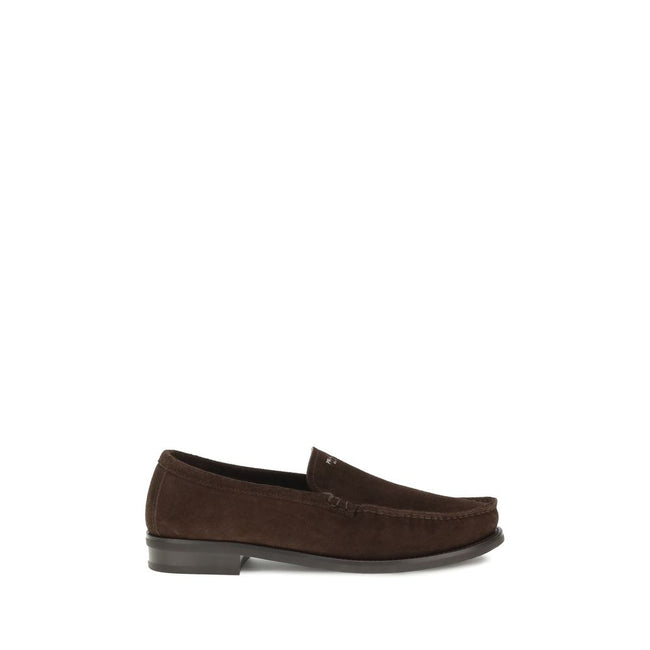Brown Calf Leather Bos Taurus Slip-On LoafersPrada’s Suede Loafers reinterpret the classic model with a tapered, lightweight silhouette, enhanced by the refined finish of suede leather. The upper is embellished with the screen-printed logo, while the rubb