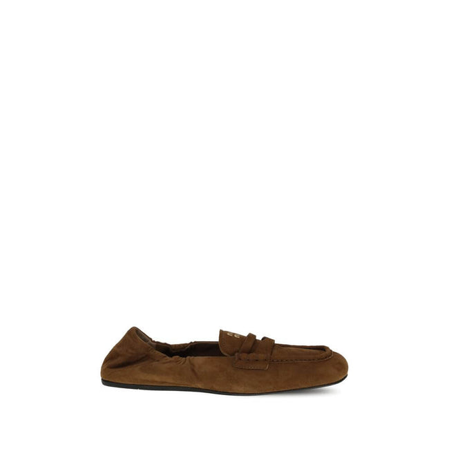 Brown Calf Leather Bos Taurus Slip-On LoafersMiu Miu’s Ruches Loafers, made of suede leather, combine comfort and style with refined details. The upper is embellished with a leather horsebit, while the lining and insole are leather to ensure softness and