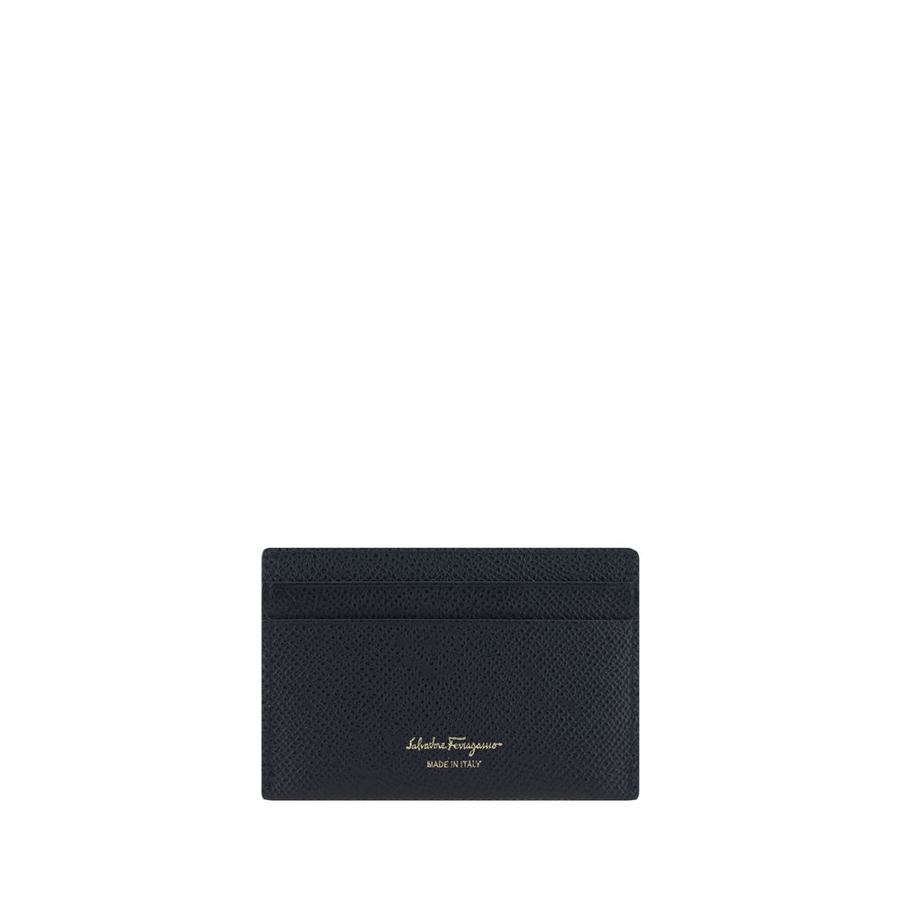 Card HolderCalfskin Card Holder by Ferragamo, grained leather design, card slot on front, iconic embossed Gancini logo on front, card slot on back, iconic brand signature printed in contrast on back. Season: AW25 Dimension: 10×10 Composition: GENERAL 100%