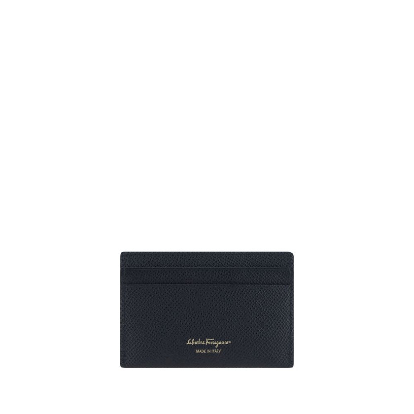 Card HolderCalfskin Card Holder by Ferragamo, grained leather design, card slot on front, iconic embossed Gancini logo on front, card slot on back, iconic brand signature printed in contrast on back. Season: AW25 Dimension: 10×10 Composition: GENERAL 100%