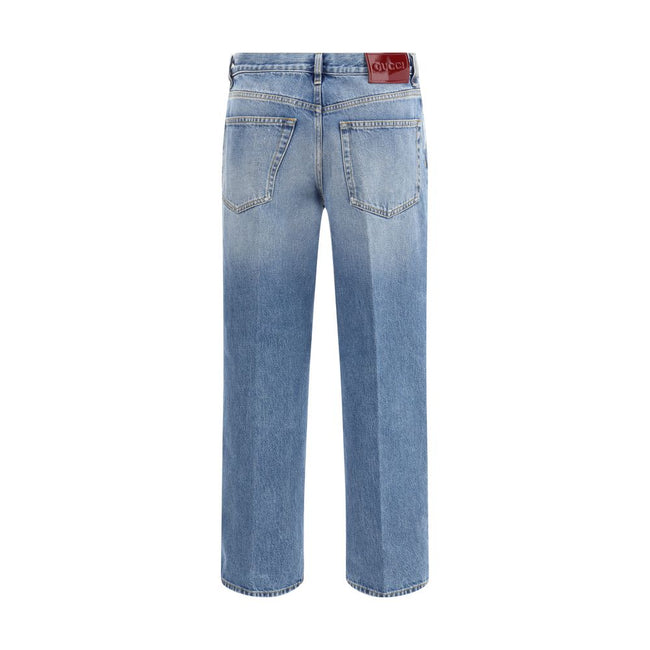 Light Blue Cotton Straight-Leg JeansGucci’s Straight Jeans feature a straight cut and a classic five-pocket design. They feature a naplak label with the Gucci Rosso Ancora logo, belt loops and a front pleat that adds a refined touch. The closure is secure