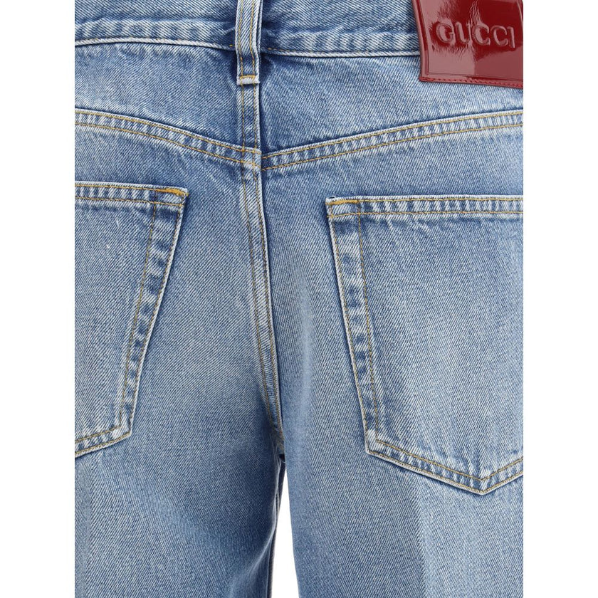 Light Blue Cotton Straight-Leg JeansGucci’s Straight Jeans feature a straight cut and a classic five-pocket design. They feature a naplak label with the Gucci Rosso Ancora logo, belt loops and a front pleat that adds a refined touch. The closure is secure