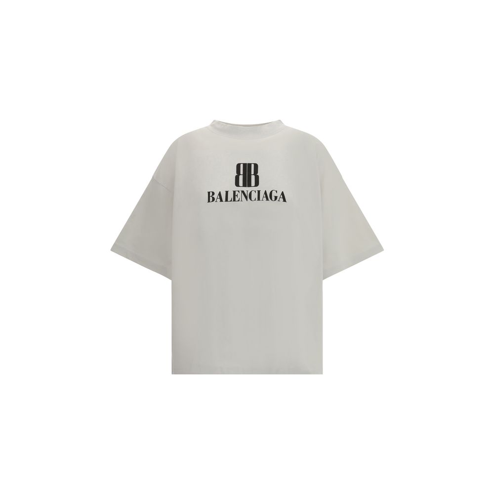 Gray Cotton T-ShirtBalenciaga’s Logo T-Shirt combines a minimal aesthetic with the house’s signature oversized lines. Made from soft cotton, it features a ribbed crew neck and dropped shoulders for a relaxed, contemporary fit. The printed logo on the fron