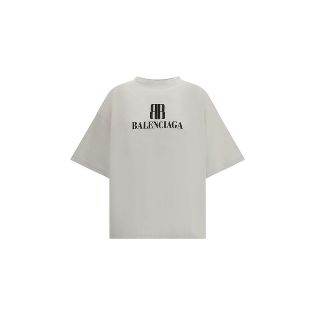 Gray Cotton T-ShirtBalenciaga’s Logo T-Shirt combines a minimal aesthetic with the house’s signature oversized lines. Made from soft cotton, it features a ribbed crew neck and dropped shoulders for a relaxed, contemporary fit. The printed logo on the fron