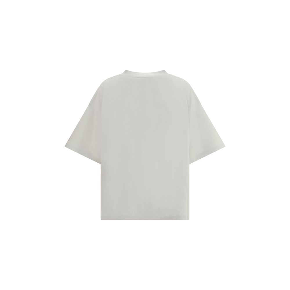 Gray Cotton T-ShirtBalenciaga’s Logo T-Shirt combines a minimal aesthetic with the house’s signature oversized lines. Made from soft cotton, it features a ribbed crew neck and dropped shoulders for a relaxed, contemporary fit. The printed logo on the fron