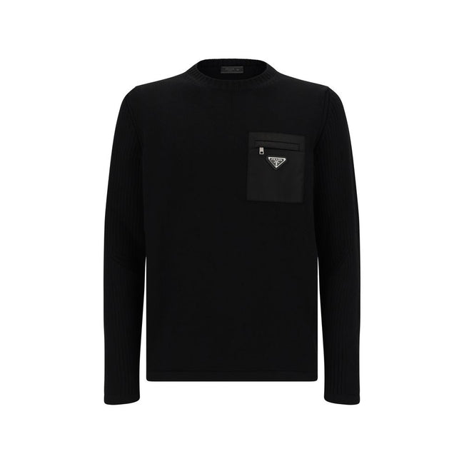 Black Fleece Wool SweatshirtVirgin Wool Knitwear by Prada, ribbed crew neck, zipper pocket applique on front, iconic triangular metal brand logo plaque on front, monochrome pattern. Season: AW25 Composition: 100% Fleece Wool MADE IN ITALYBlack Fleece Wool
