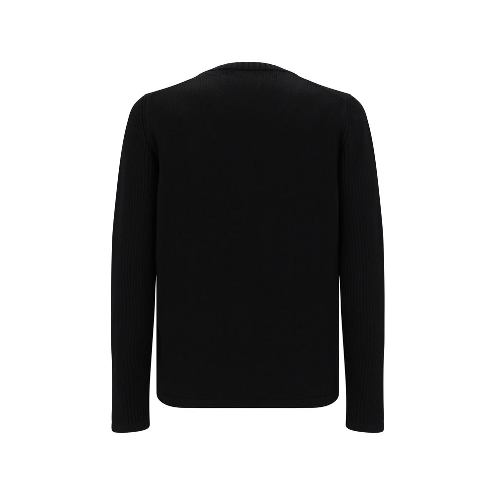 Black Fleece Wool SweatshirtVirgin Wool Knitwear by Prada, ribbed crew neck, zipper pocket applique on front, iconic triangular metal brand logo plaque on front, monochrome pattern. Season: AW25 Composition: 100% Fleece Wool MADE IN ITALYBlack Fleece Wool