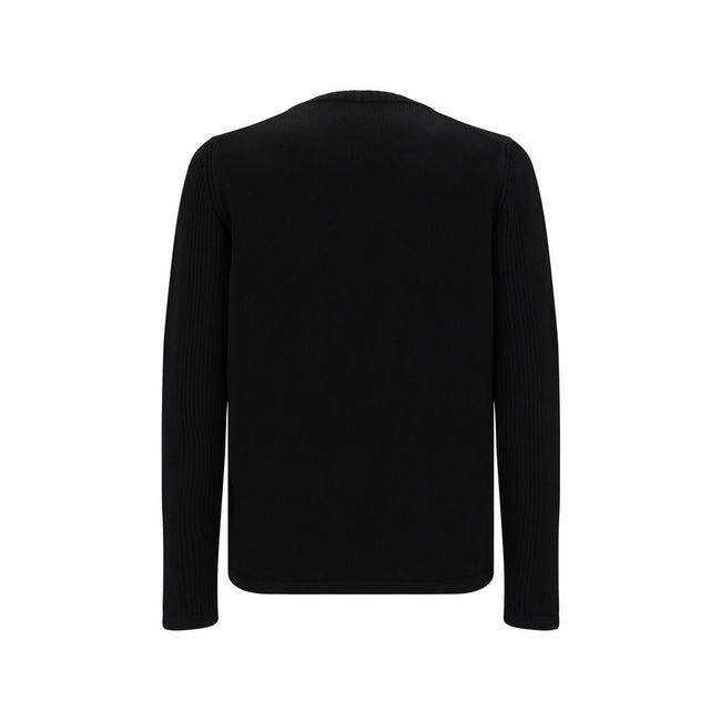 Black Fleece Wool SweatshirtVirgin Wool Knitwear by Prada, ribbed crew neck, zipper pocket applique on front, iconic triangular metal brand logo plaque on front, monochrome pattern. Season: AW25 Composition: 100% Fleece Wool MADE IN ITALYBlack Fleece Wool