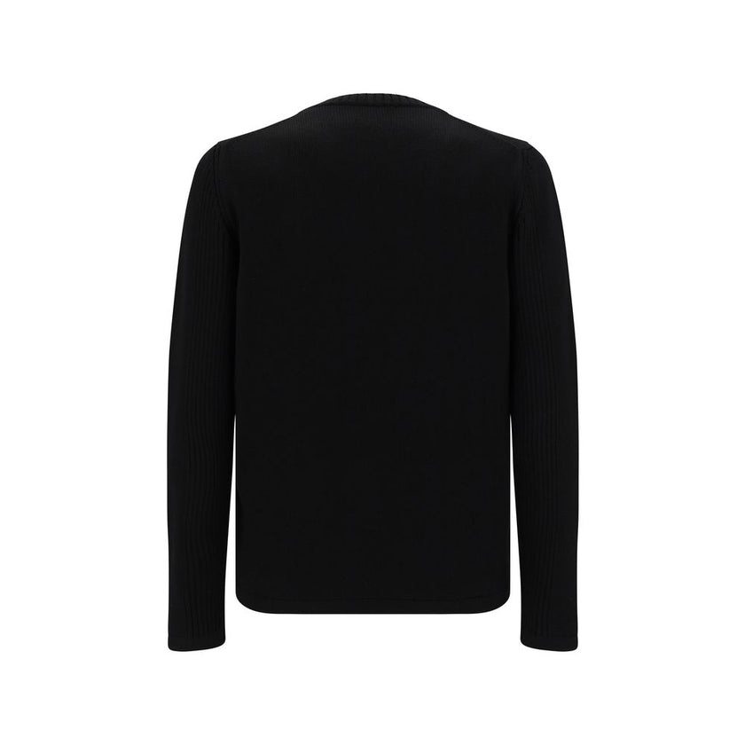 Black Fleece Wool SweatshirtVirgin Wool Knitwear by Prada, ribbed crew neck, zipper pocket applique on front, iconic triangular metal brand logo plaque on front, monochrome pattern. Season: AW25 Composition: 100% Fleece Wool MADE IN ITALYBlack Fleece Wool