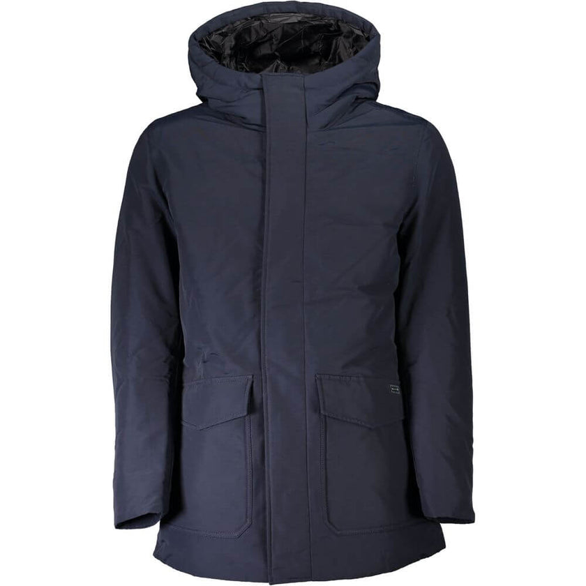 Blue Cotton Men JacketElevate your outdoor ensemble with the Woolrich Long Jacket, a perfect blend of style and practicality. Designed with resilience in mind, this jacket comes equipped with a snug hood, handy dual pockets, and a secure zip and button cl