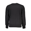 Black Cotton Men SweaterDive into the world of upscale comfort with Calvin Klein’s long sleeve sweatshirt. A sleek black hue meets the iconic logo emblazoned front and center, offering a bold statement piece for your wardrobe. Crafted from a cozy blend of