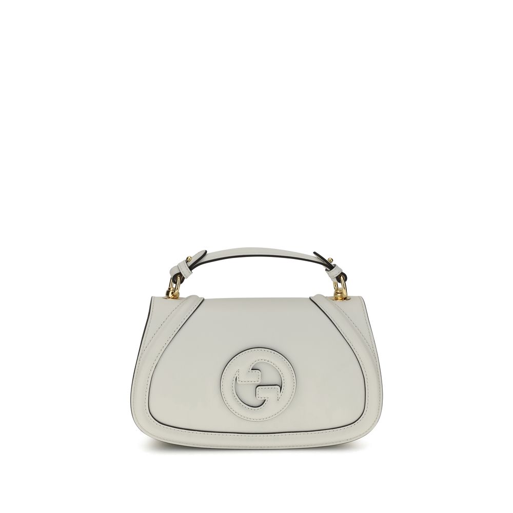 White Calf Leather Bos Taurus HandbagGucci’s Blondie Handbag, made of smooth leather, features an elegant tonal leather GG applique on the front. Equipped with a removable flat handle and adjustable shoulder strap also in tonal leather, it offers multiple