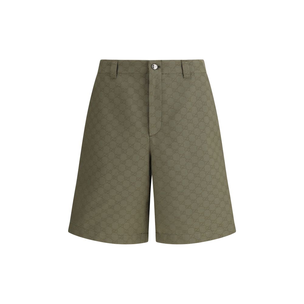 Green Cotton Bermuda ShortsGucci’s GG pattern Shorts combine the iconic monogrammed motif with an essential and versatile silhouette. They feature a front zipper and button closure, enhanced by belt loops at the waist, a detail that enhances the fit. A ga