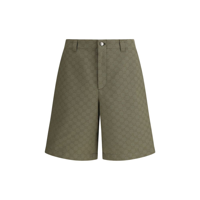 Green Cotton Bermuda ShortsGucci’s GG pattern Shorts combine the iconic monogrammed motif with an essential and versatile silhouette. They feature a front zipper and button closure, enhanced by belt loops at the waist, a detail that enhances the fit. A ga
