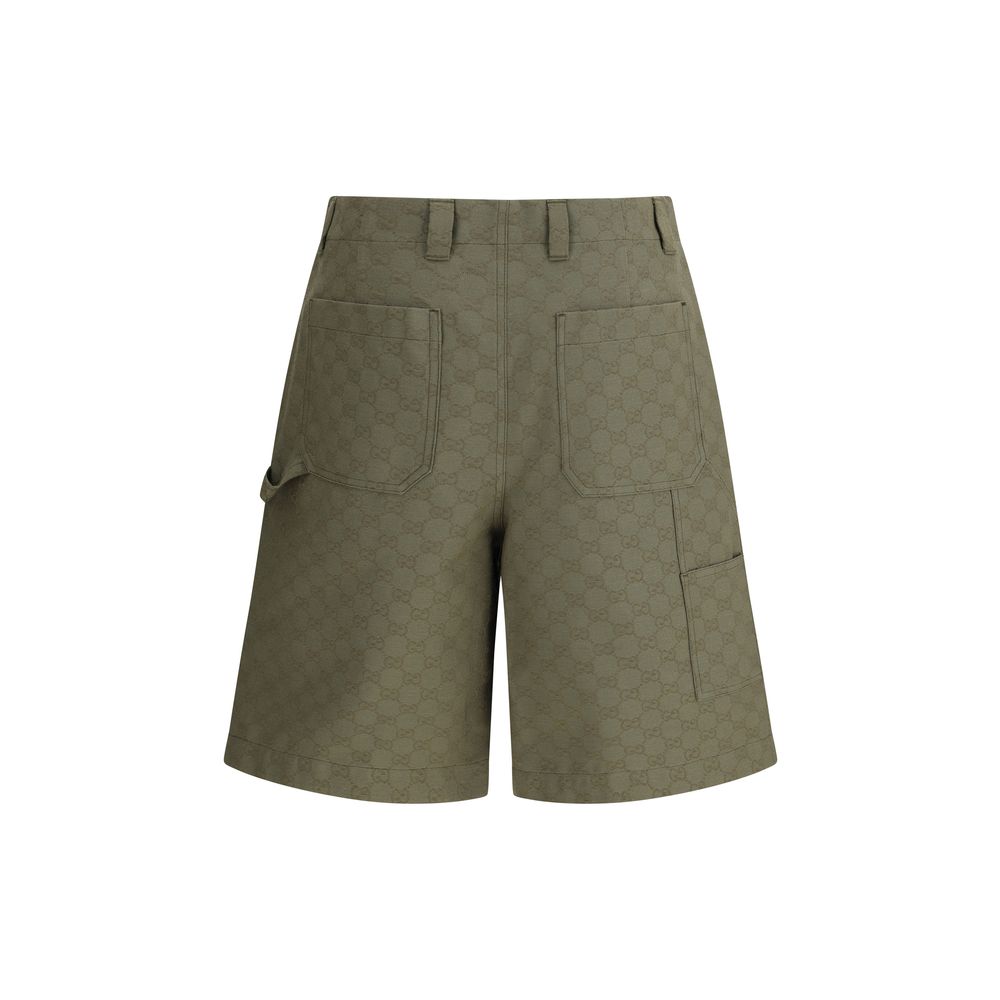 Green Cotton Bermuda ShortsGucci’s GG pattern Shorts combine the iconic monogrammed motif with an essential and versatile silhouette. They feature a front zipper and button closure, enhanced by belt loops at the waist, a detail that enhances the fit. A ga