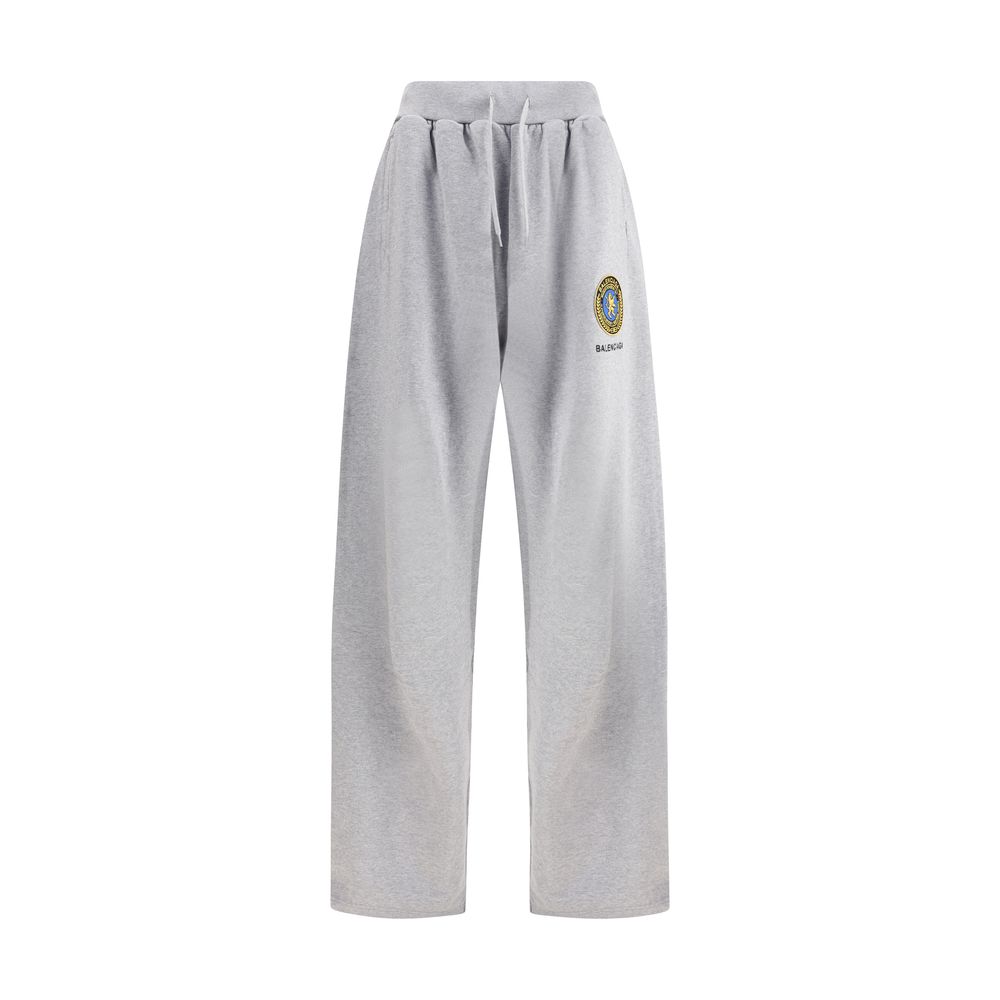 Gray Cotton Joggers (Workout Pants)Balenciaga’s Patched Sweatpants combine comfort and urban style. Made of gray mélange fabric, they feature a straight leg and an elasticated waistband with drawstring for an adjustable fit. Completing the design are two