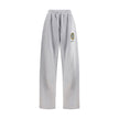 Gray Cotton Joggers (Workout Pants)Balenciaga’s Patched Sweatpants combine comfort and urban style. Made of gray mélange fabric, they feature a straight leg and an elasticated waistband with drawstring for an adjustable fit. Completing the design are two