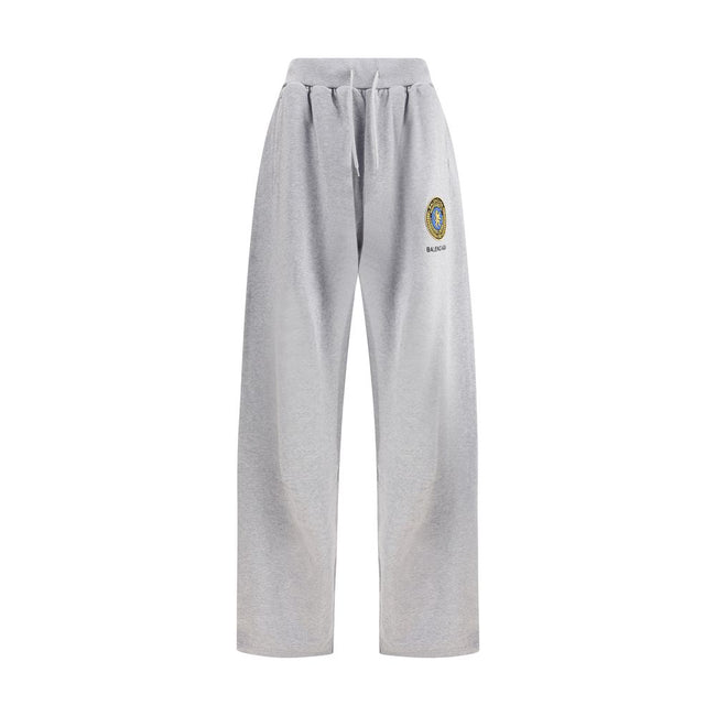 Gray Cotton Joggers (Workout Pants)Balenciaga’s Patched Sweatpants combine comfort and urban style. Made of gray mélange fabric, they feature a straight leg and an elasticated waistband with drawstring for an adjustable fit. Completing the design are two