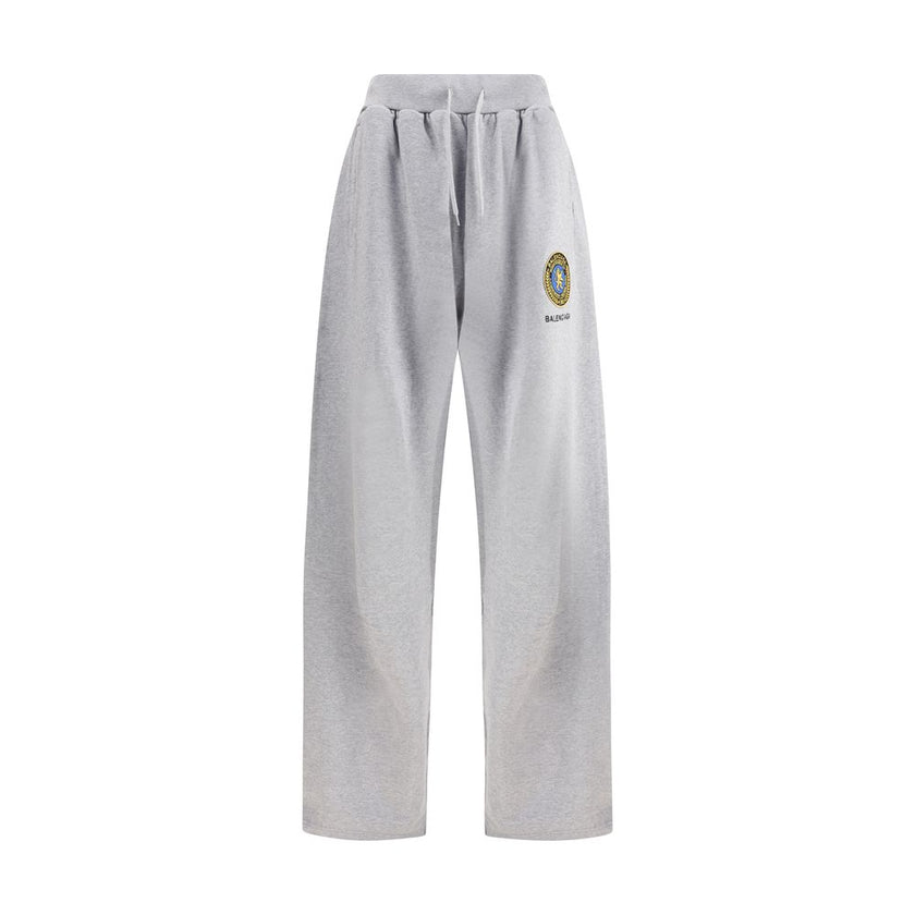 Gray Cotton Joggers (Workout Pants)Balenciaga’s Patched Sweatpants combine comfort and urban style. Made of gray mélange fabric, they feature a straight leg and an elasticated waistband with drawstring for an adjustable fit. Completing the design are two