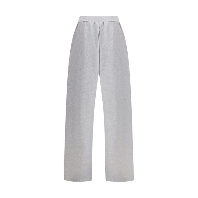 Gray Cotton Joggers (Workout Pants)Balenciaga’s Patched Sweatpants combine comfort and urban style. Made of gray mélange fabric, they feature a straight leg and an elasticated waistband with drawstring for an adjustable fit. Completing the design are two