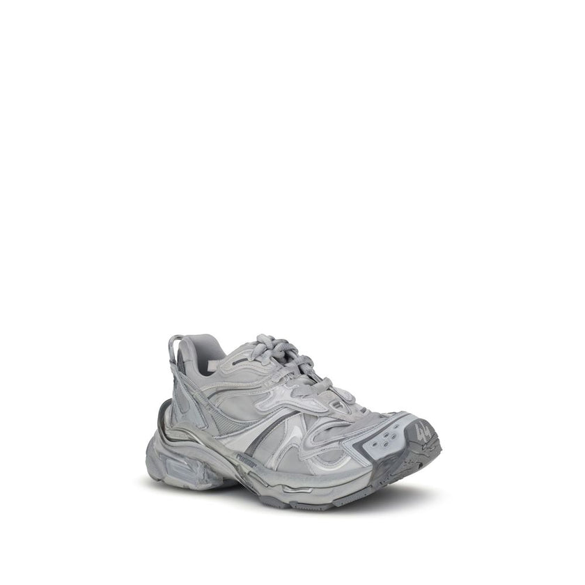 Gray Polyester Platform SneakersBalenciaga’s Runner 2 Sneakers feature a structured platform sole that lends height and comfort. The woven leather panel design is enhanced with neon details, adding a dynamic and modern touch. The front lace-up closure ens