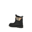 Black Rubber Ankle BootsBurberry’s Marsh Stamp rubber Ankle Boots feature a round toe and the iconic Equestrian Knight Design stamped on the front. Burberry lettering is featured on the sole, completing a practical model with a distinctive style, ideal fo