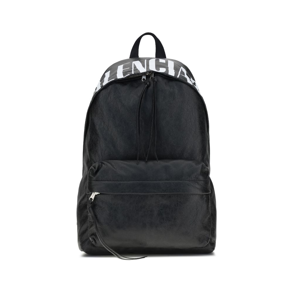 Black Lamb Ovis Aries Aries BackpackThe Crinkle Effect lambskin Backpack stands out for its modern design and soft, refined texture. The printed logo on the top adds a graphic and distinctive touch. Featuring a tone-on-tone fabric flat handle, adjustable
