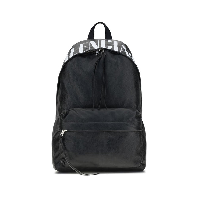 Black Lamb Ovis Aries Aries BackpackThe Crinkle Effect lambskin Backpack stands out for its modern design and soft, refined texture. The printed logo on the top adds a graphic and distinctive touch. Featuring a tone-on-tone fabric flat handle, adjustable