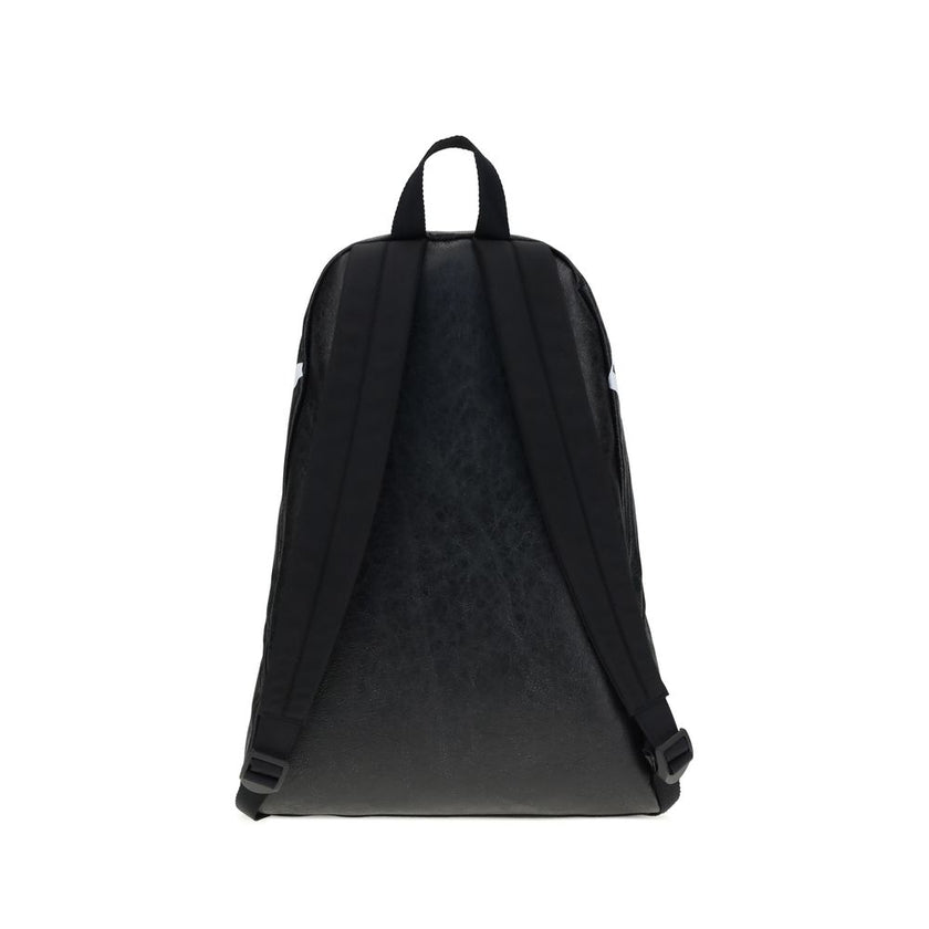 Black Lamb Ovis Aries Aries BackpackThe Crinkle Effect lambskin Backpack stands out for its modern design and soft, refined texture. The printed logo on the top adds a graphic and distinctive touch. Featuring a tone-on-tone fabric flat handle, adjustable