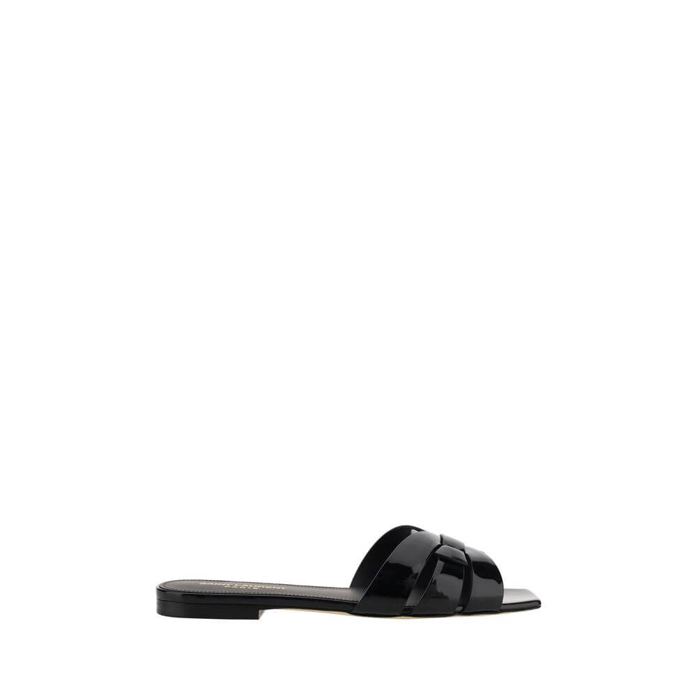 Black Calf Leather Bos Taurus Flat SandalsCalfskin Tribute Sandals by Saint Laurent, square toe, flat sole, woven on front, logoed insole. Season: AW25 Composition: SOLE 100% Calf Leather Bos Taurus UPPER 100% Calf Leather Bos Taurus MADE IN ITALYBlack Ca