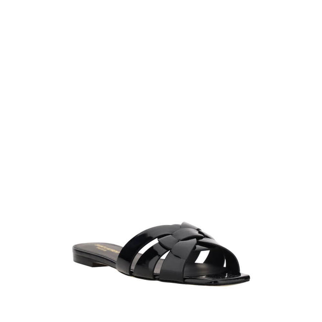 Black Calf Leather Bos Taurus Flat SandalsCalfskin Tribute Sandals by Saint Laurent, square toe, flat sole, woven on front, logoed insole. Season: AW25 Composition: SOLE 100% Calf Leather Bos Taurus UPPER 100% Calf Leather Bos Taurus MADE IN ITALYBlack Ca