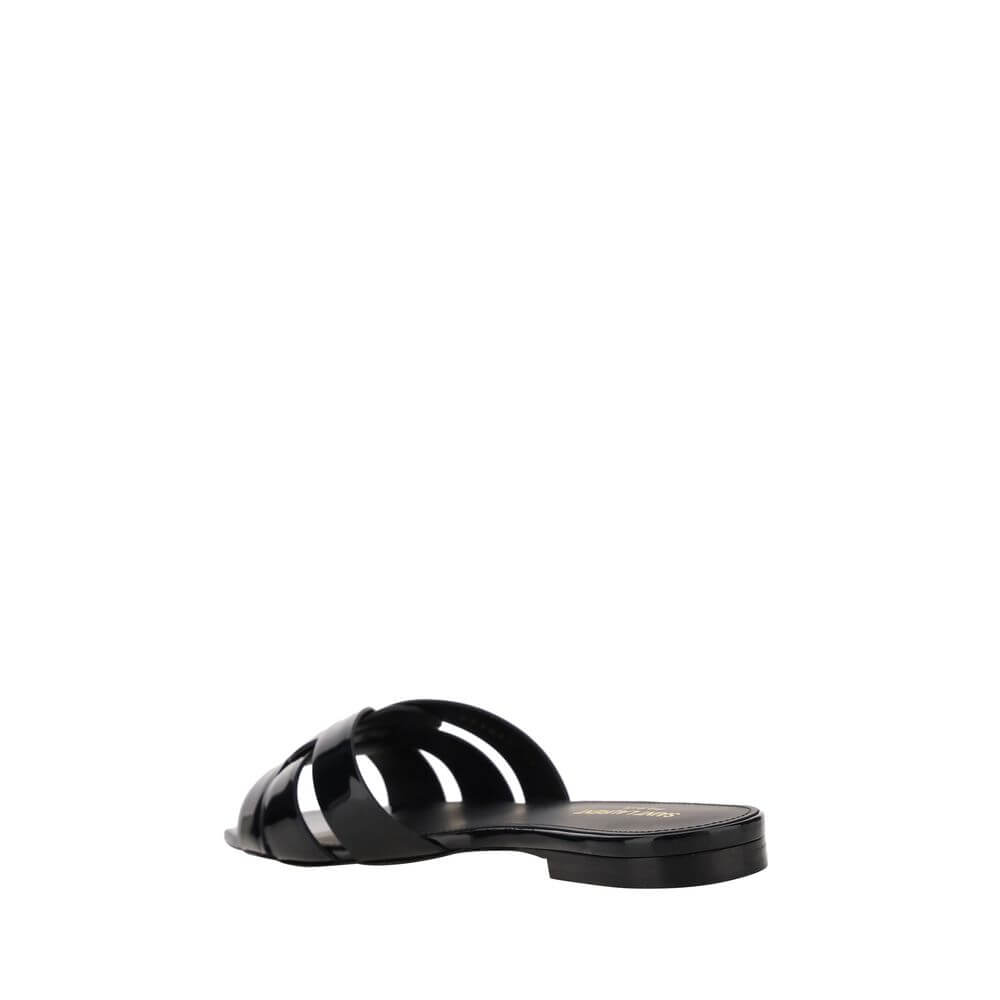 Black Calf Leather Bos Taurus Flat SandalsCalfskin Tribute Sandals by Saint Laurent, square toe, flat sole, woven on front, logoed insole. Season: AW25 Composition: SOLE 100% Calf Leather Bos Taurus UPPER 100% Calf Leather Bos Taurus MADE IN ITALYBlack Ca