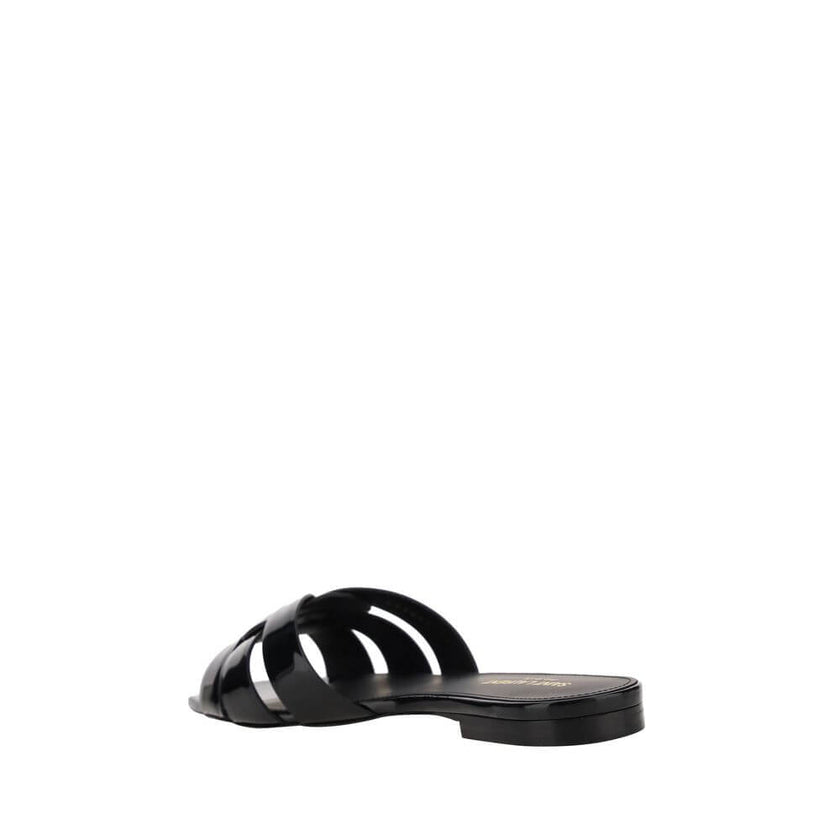 Black Calf Leather Bos Taurus Flat SandalsCalfskin Tribute Sandals by Saint Laurent, square toe, flat sole, woven on front, logoed insole. Season: AW25 Composition: SOLE 100% Calf Leather Bos Taurus UPPER 100% Calf Leather Bos Taurus MADE IN ITALYBlack Ca