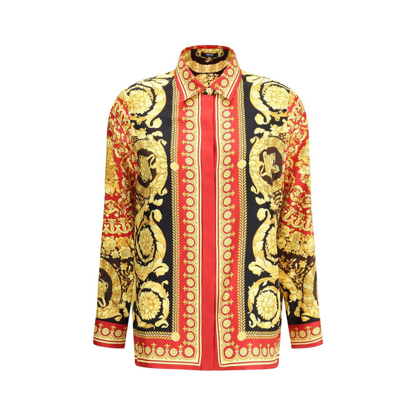 Multicolor Silk Pattern ShirtVersace’s Pure Silk Shirt is a luxury garment with distinctive character, embellished with the iconic Barocco print that decorates the entire surface. The short point collar and concealed button closure enhance the sophisticat