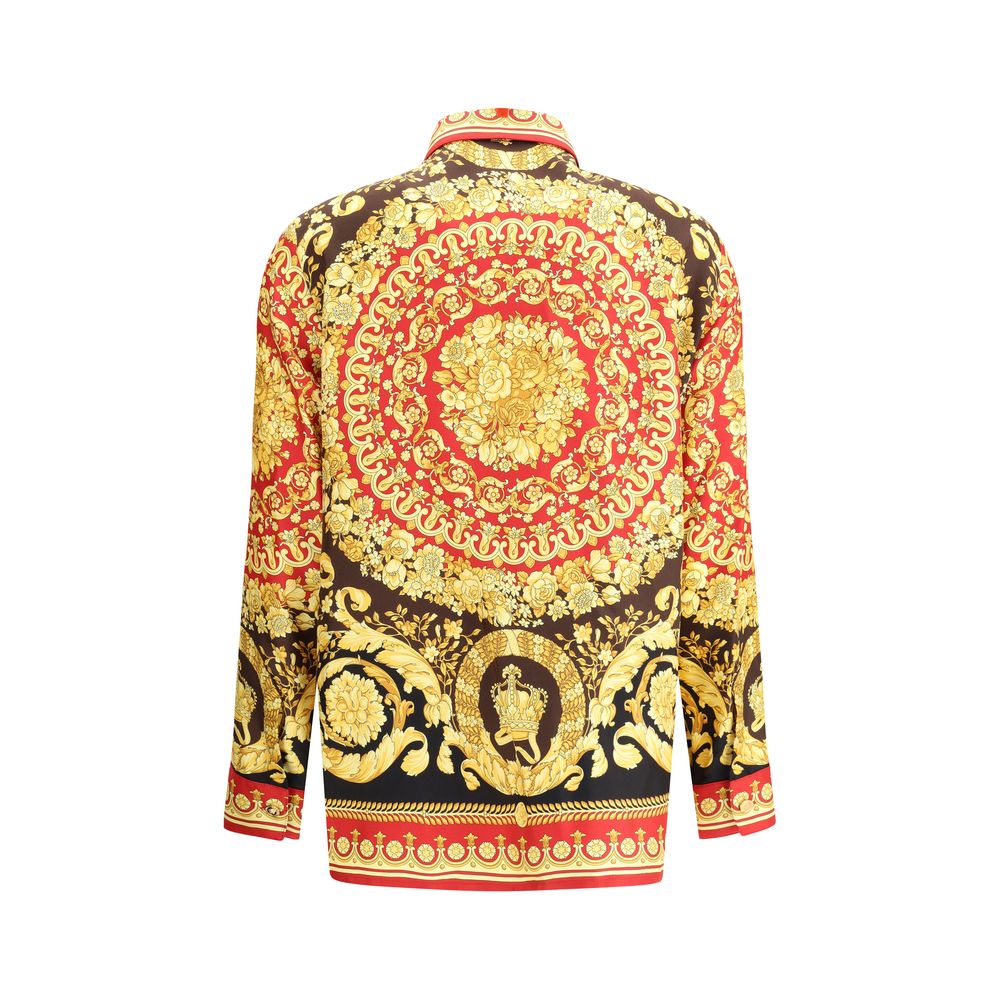 Multicolor Silk Pattern ShirtVersace’s Pure Silk Shirt is a luxury garment with distinctive character, embellished with the iconic Barocco print that decorates the entire surface. The short point collar and concealed button closure enhance the sophisticat