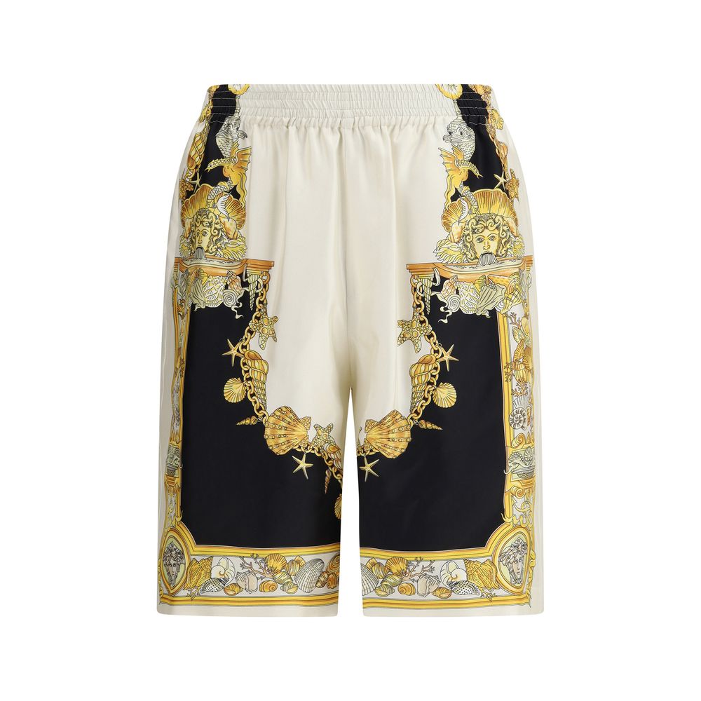 Multicolor Silk Bermuda ShortsVersace’s Barocco Shorts stand out for their bold and luxurious character, thanks to the iconic all-over Barocco print that makes them instantly recognizable. Equipped with an elasticized waistband for optimal comfort, they f