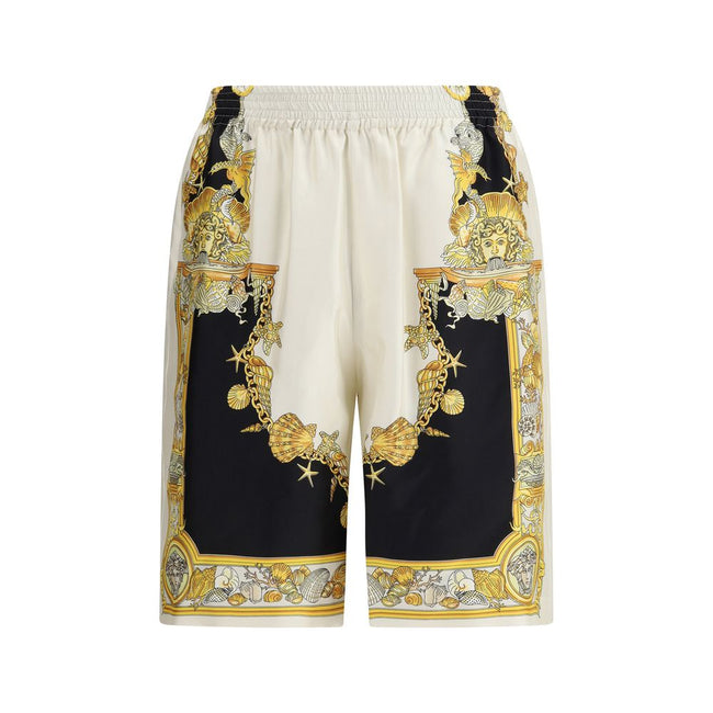 Multicolor Silk Bermuda ShortsVersace’s Barocco Shorts stand out for their bold and luxurious character, thanks to the iconic all-over Barocco print that makes them instantly recognizable. Equipped with an elasticized waistband for optimal comfort, they f