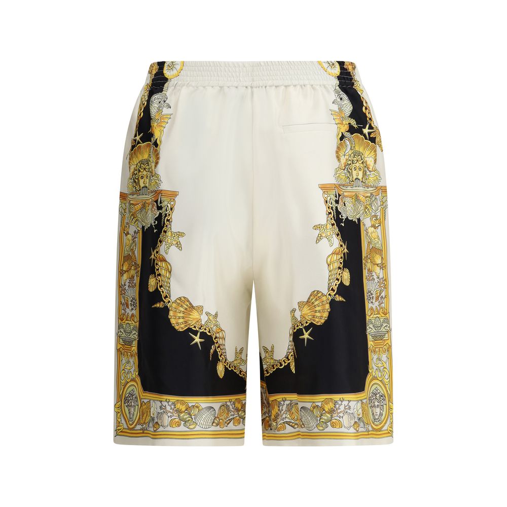 Multicolor Silk Bermuda ShortsVersace’s Barocco Shorts stand out for their bold and luxurious character, thanks to the iconic all-over Barocco print that makes them instantly recognizable. Equipped with an elasticized waistband for optimal comfort, they f