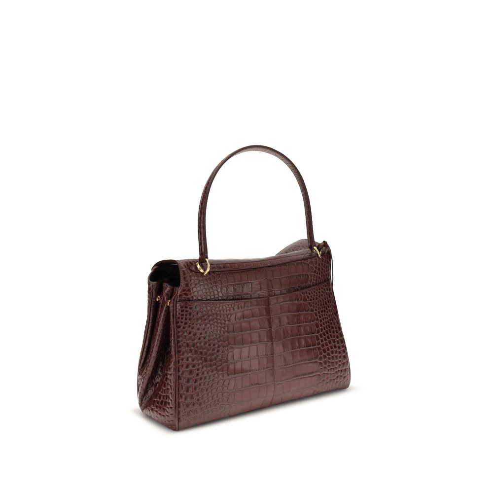 Brown Calf Leather Bos Taurus HandbagLeather Medium Rodeo Handbag by Balenciaga, single removable top handle, charm with key ring detail applied at base of handle, dual compartment, flap closure with swivel system at front, crocodile-effect leather design