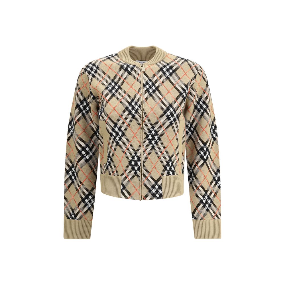 Beige Wool CardiganBurberry’s Check Cardigan is a casual-inspired garment enhanced by the house’s unmistakable check pattern. Featuring a front zipper closure, it has a ribbed collar, hem and cuffs for a comfortable, fitted fit. The two side welt pockets