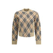 Beige Wool CardiganBurberry’s Check Cardigan is a casual-inspired garment enhanced by the house’s unmistakable check pattern. Featuring a front zipper closure, it has a ribbed collar, hem and cuffs for a comfortable, fitted fit. The two side welt pockets